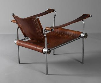 A unique Hans Asplund steel and brown leather armchair, for KF, Sweden 1949.