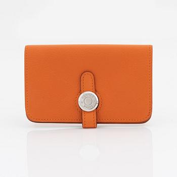 Hermès, a orange leather 'Dogon' wallet, 1998.