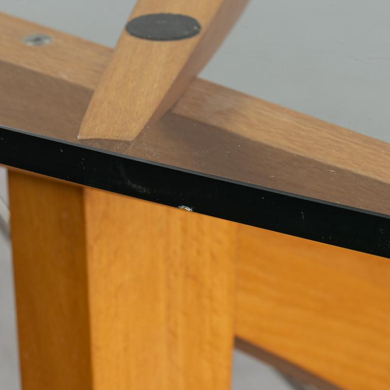 A dining table, Italy 1980-90s.