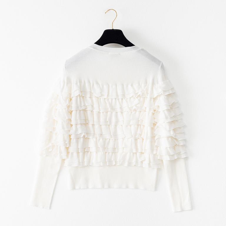 Chanel, a knitted wool sweatshirt, french size 34.