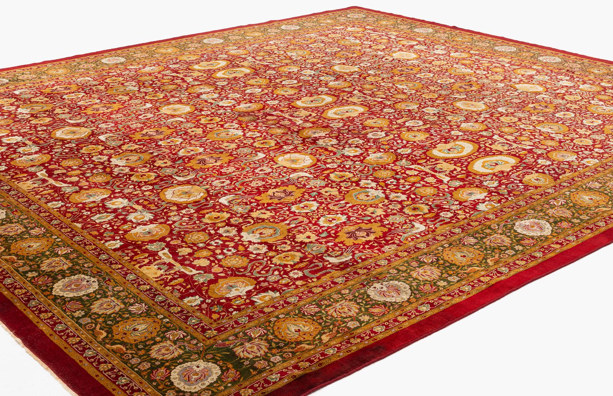 An antique Lahore carpet, northern India (todays Pakistan), approx. 463 x 404 cm.