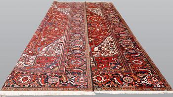 A  semi-antique Heris carpet, approx. 396 x 286 cm.