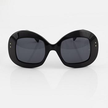 Oliver Goldsmith, a pair of black "Uuksu" sunglasses.