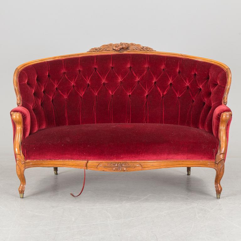 A sofa, circa 1900.