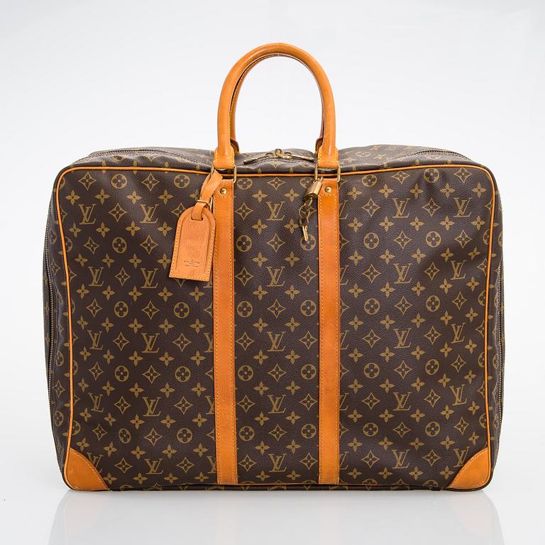 Louis Vuitton, A Monogram Canvas Sirius 55 Suitcase.