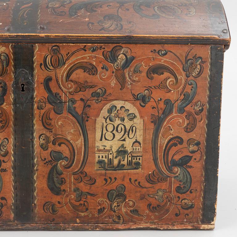A wooden Dalecarlian chest, Sweden, dated 1820.