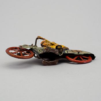 A tinplate Huki roundabout motorcycle, Germany, 1930s.