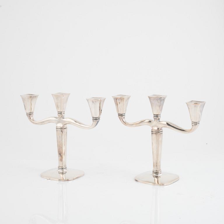 A pair of silver candlesticks, Swedish import marks, first half of the 20th Century.