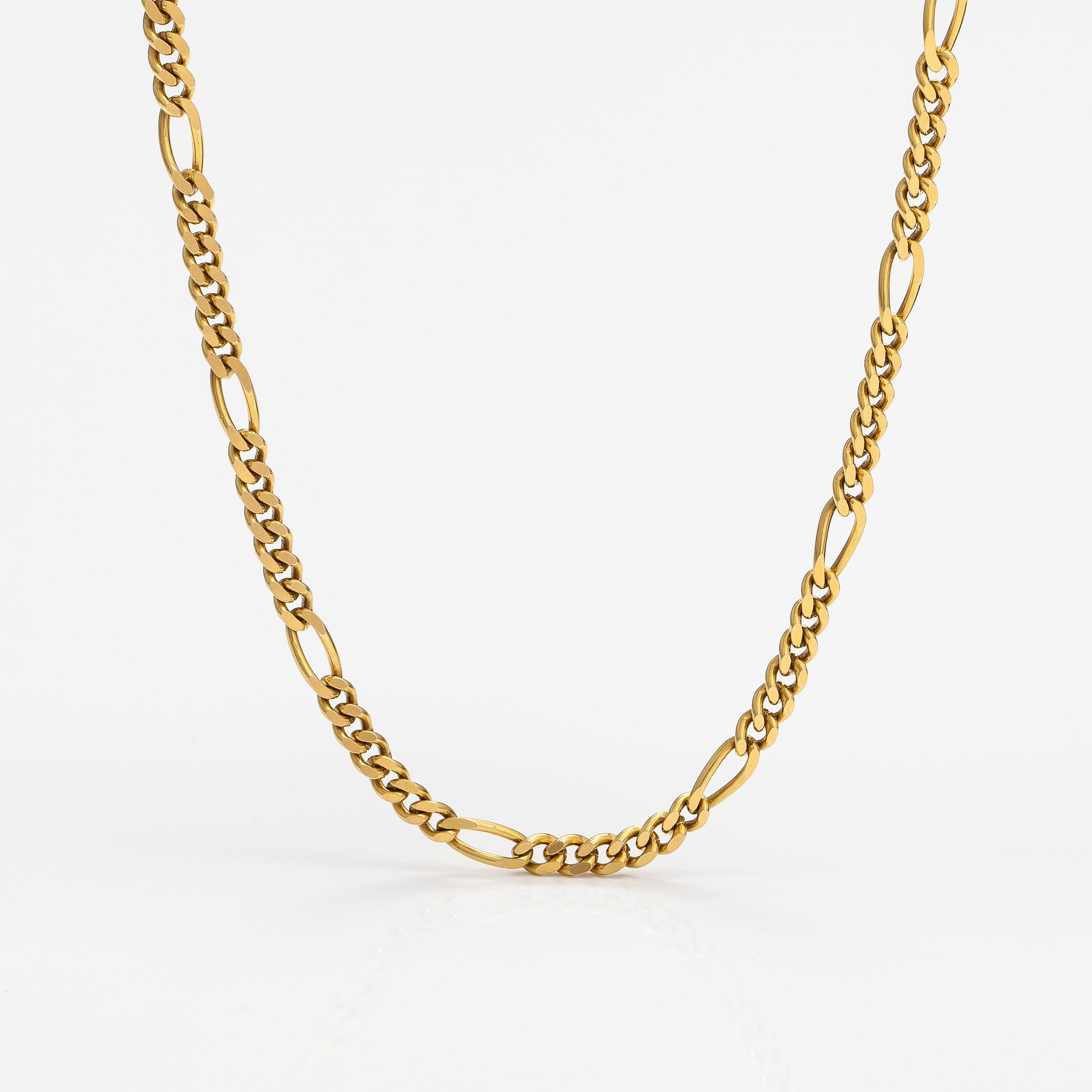 An 18K gold neckalce with stones. Erling Kaj Oy Ab, Helsinki 1977.