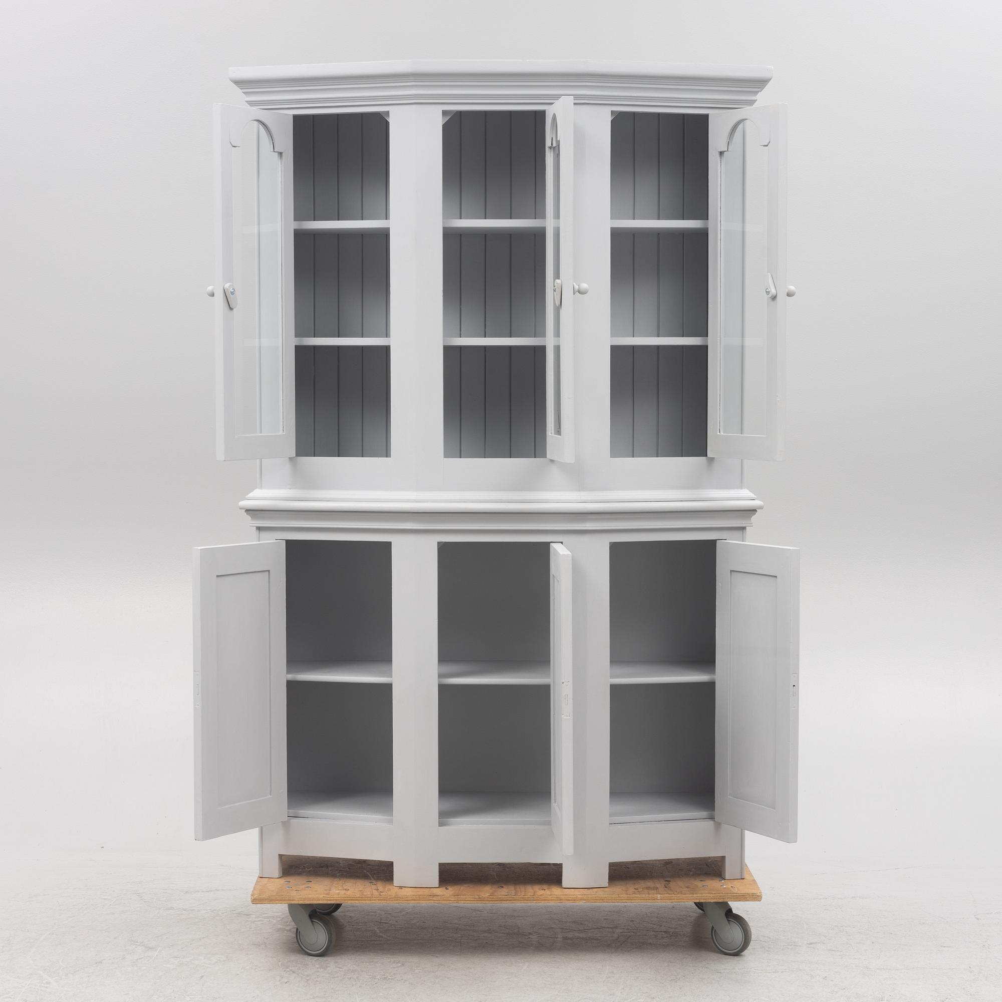 A display cabinet, 20th Century.