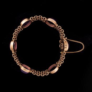 ARMBAND, 18K guld, ametister. Hugo Olsson, Sverige 1971. Vikt ca 22,4 g.