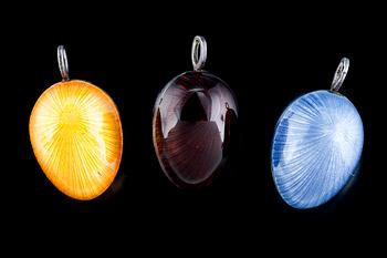 204. 3 EGG PENDANTS.