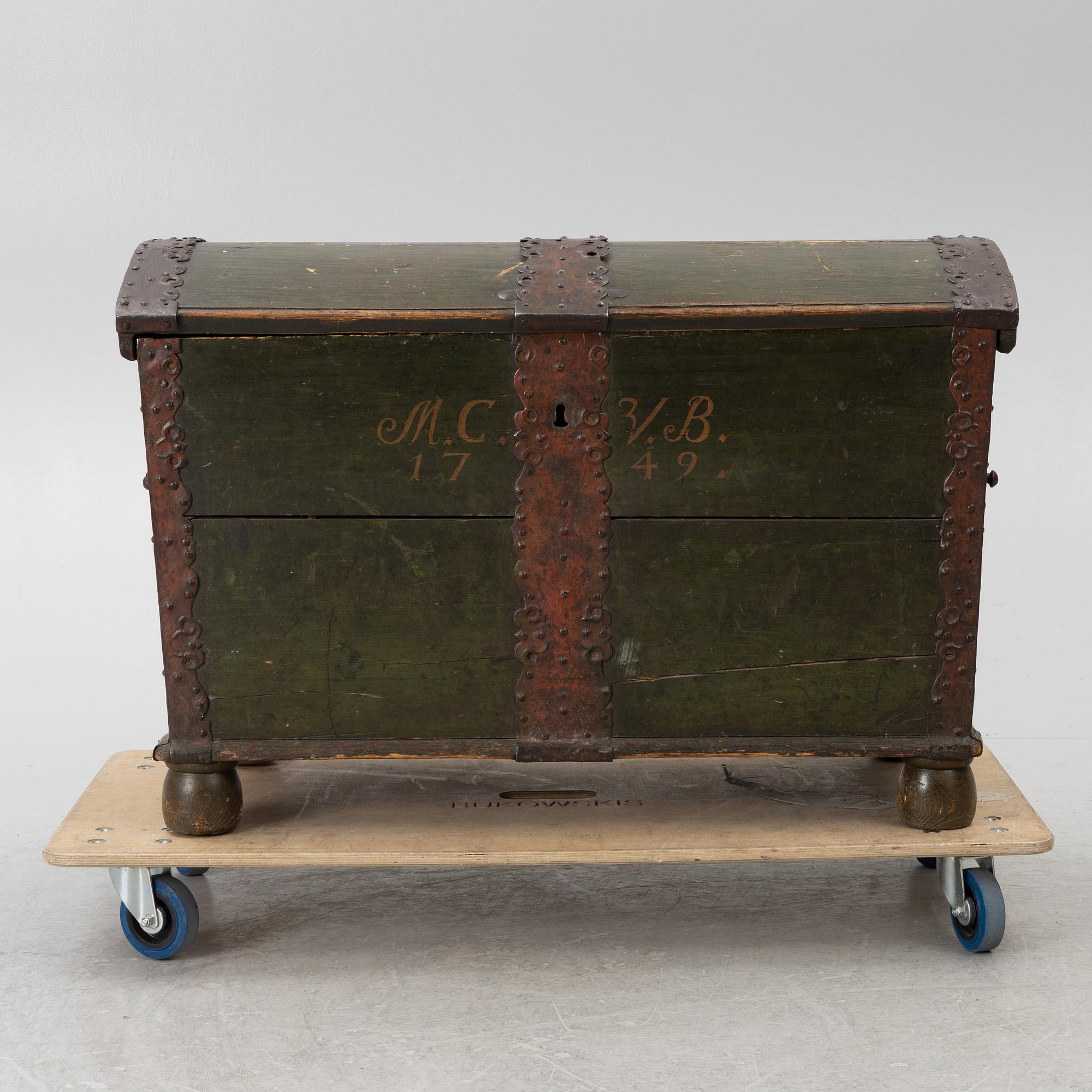 A folk art chest, dated 1749.