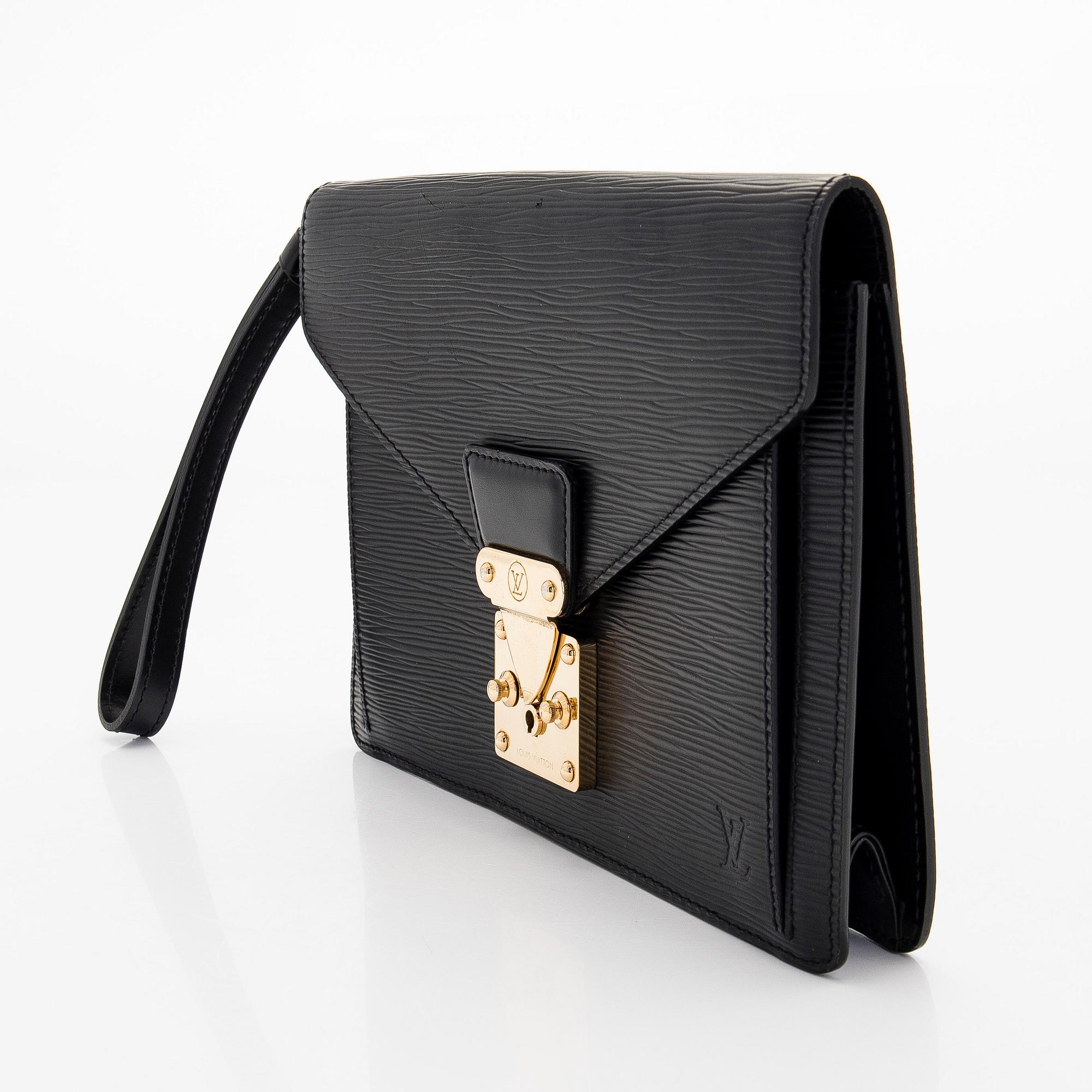 Louis Vuitton, laukku/clutch, ”Sellier Dragonne”.