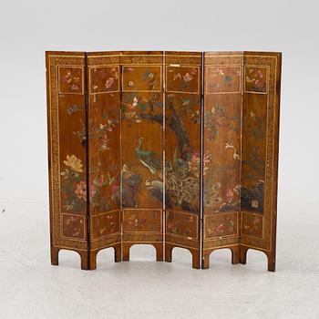 A Chinese six panel wooden folding screen, first half of the 20th Century.