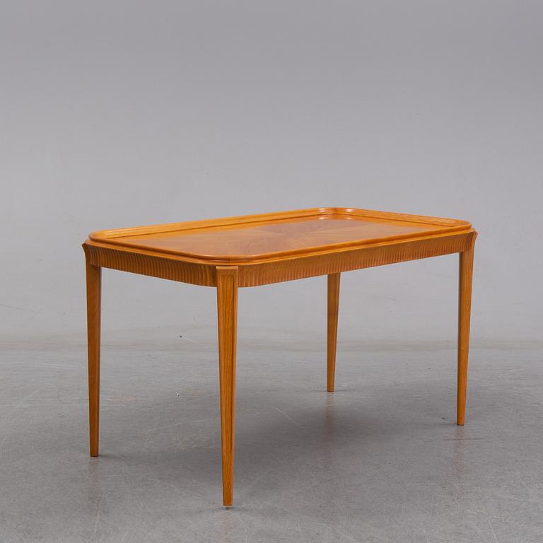 An elm Swedish Modern coffee table, dated 11 11 1947.