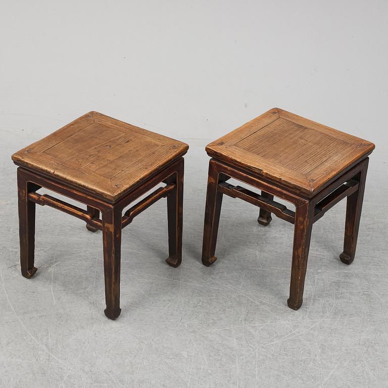 A pair of hardwood tables, 20th century.