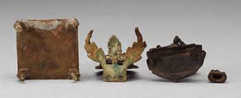 A set of three bronze figures of Buddha and a throne, India, 17/18th Century.