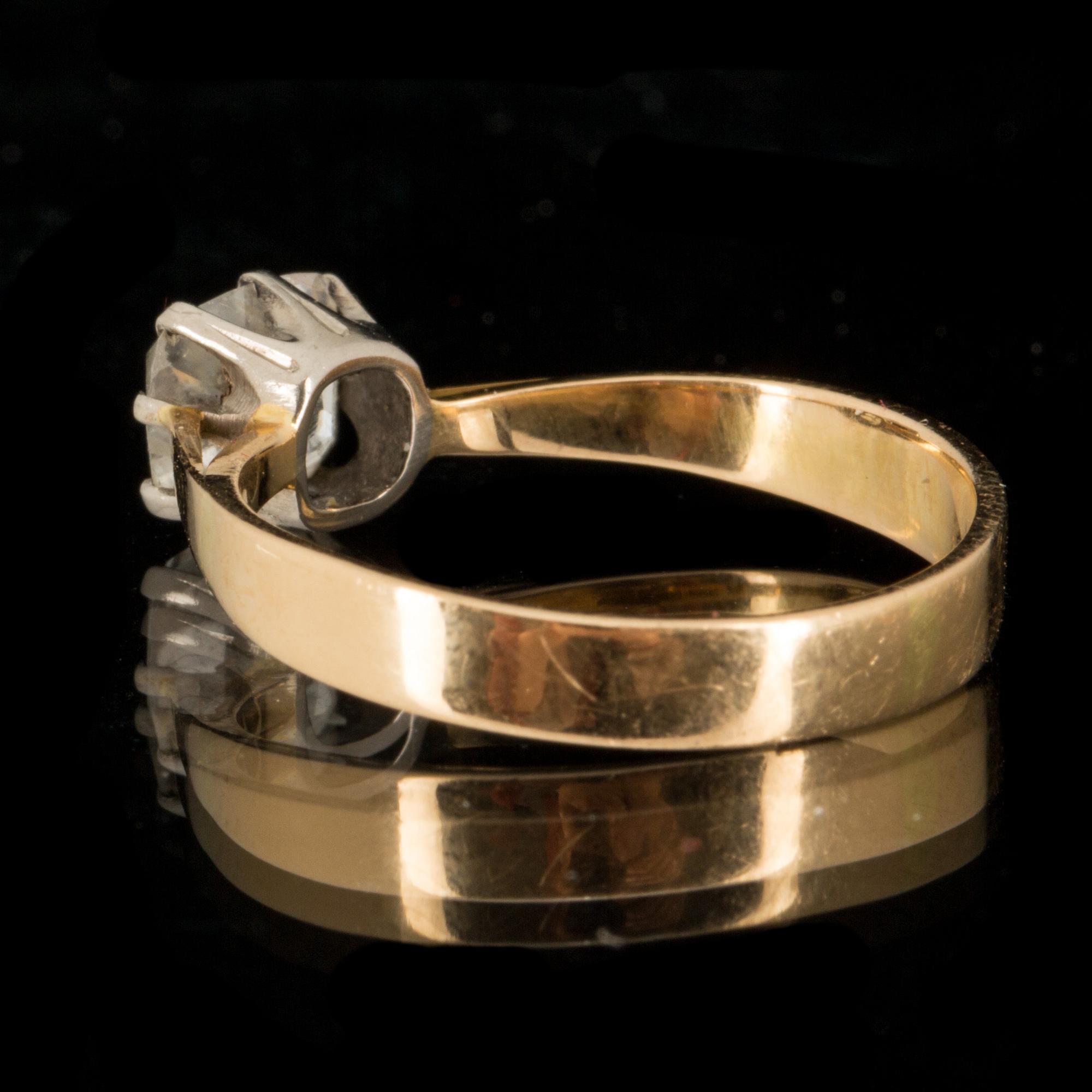 RING, guld med diamant, totalt ca 0,90 ct. 1945. Vikt ca 1,5 gram.