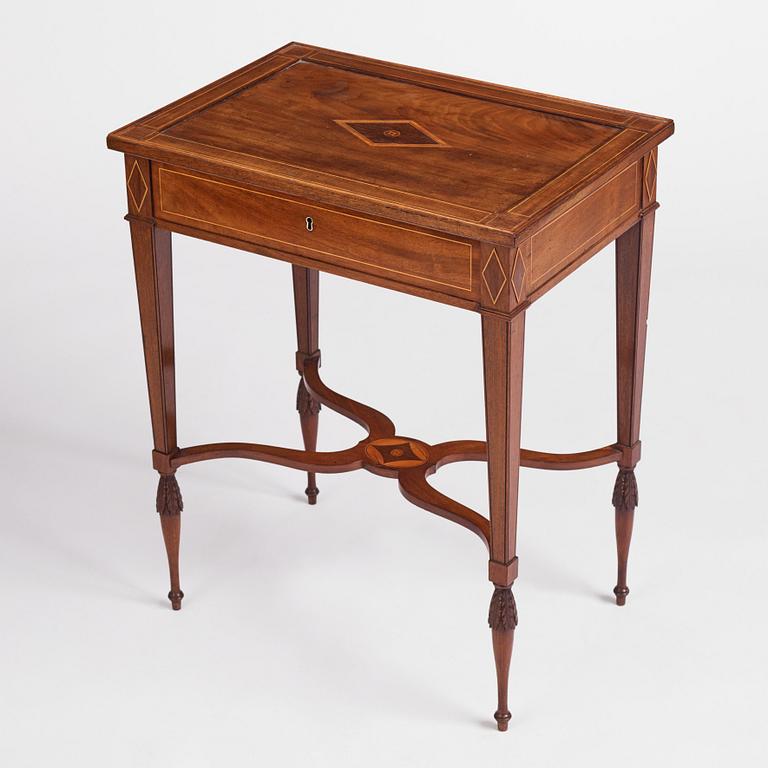 A late Gustavian mahogany table attributed to L. Qvarnberg (master in Stockholm 1801-1813).