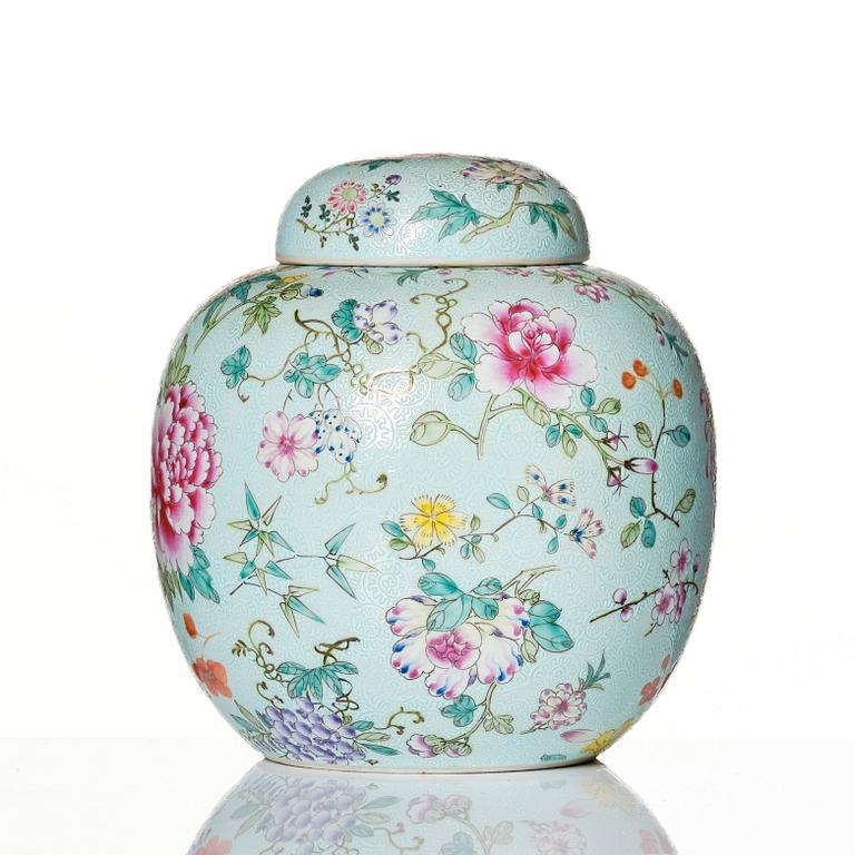 A Chinese mille fleur jar with cover, 20th Century, with Guangxu mark to base.