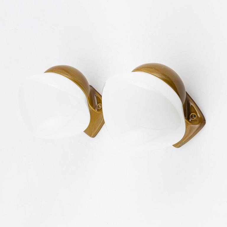 Gunnar Nylund, a pair of glass and porcelain wall lights from the 'Lyx' series, Ifö Electric, Sweden, 1960's.