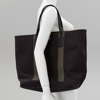 A Beach leather-trimmed canvas tote Saint Laurent.