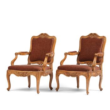 67. A pair of rococo fauteuils, Stockholm, later part 18th century.