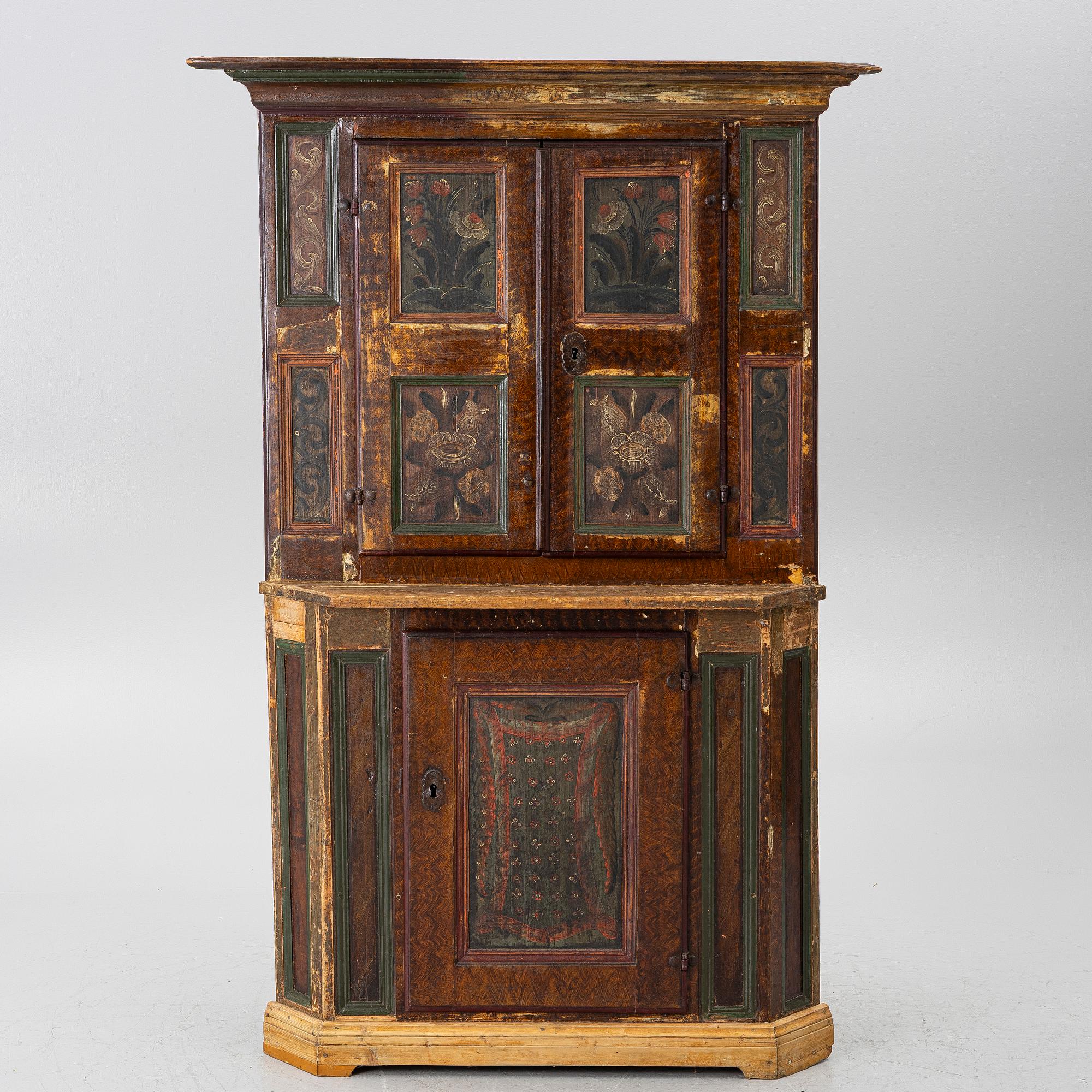 A corner cupboard, dated 1779.
