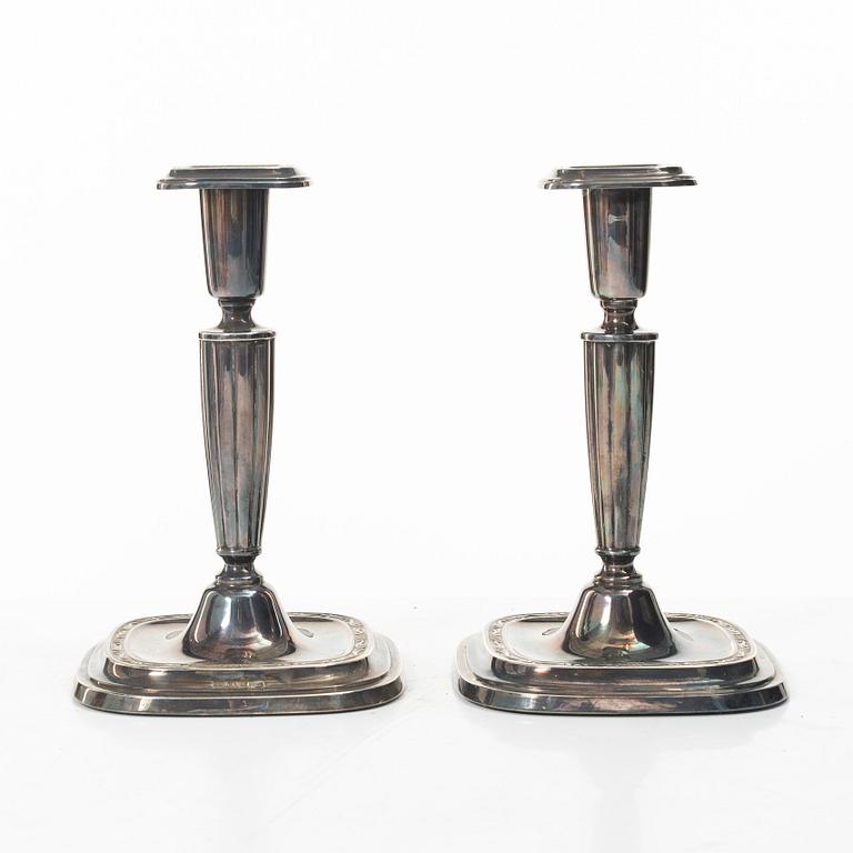A pair of sterling silver candlesticks, C.G.Hallberg, Stockholm, Sweden, 1959.
