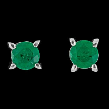 1050. A pair of emerald earrings.