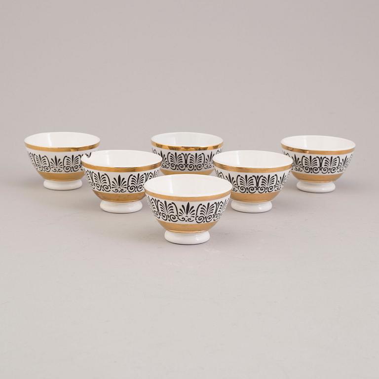 PIERO FORNASETTI, 6 bowls and 6 small plates "Astrolabio".