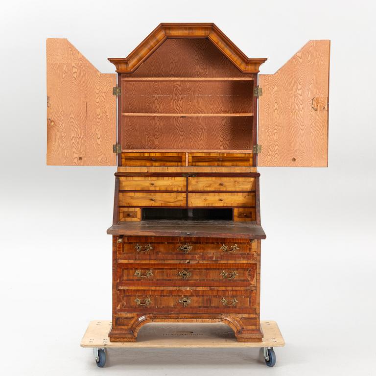 A Swedish late Baroque walnut marquetry writing cabinet.