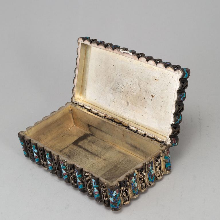 A Chinese copper plated with silver and alpaca and enamelled box with cover, 20th century.