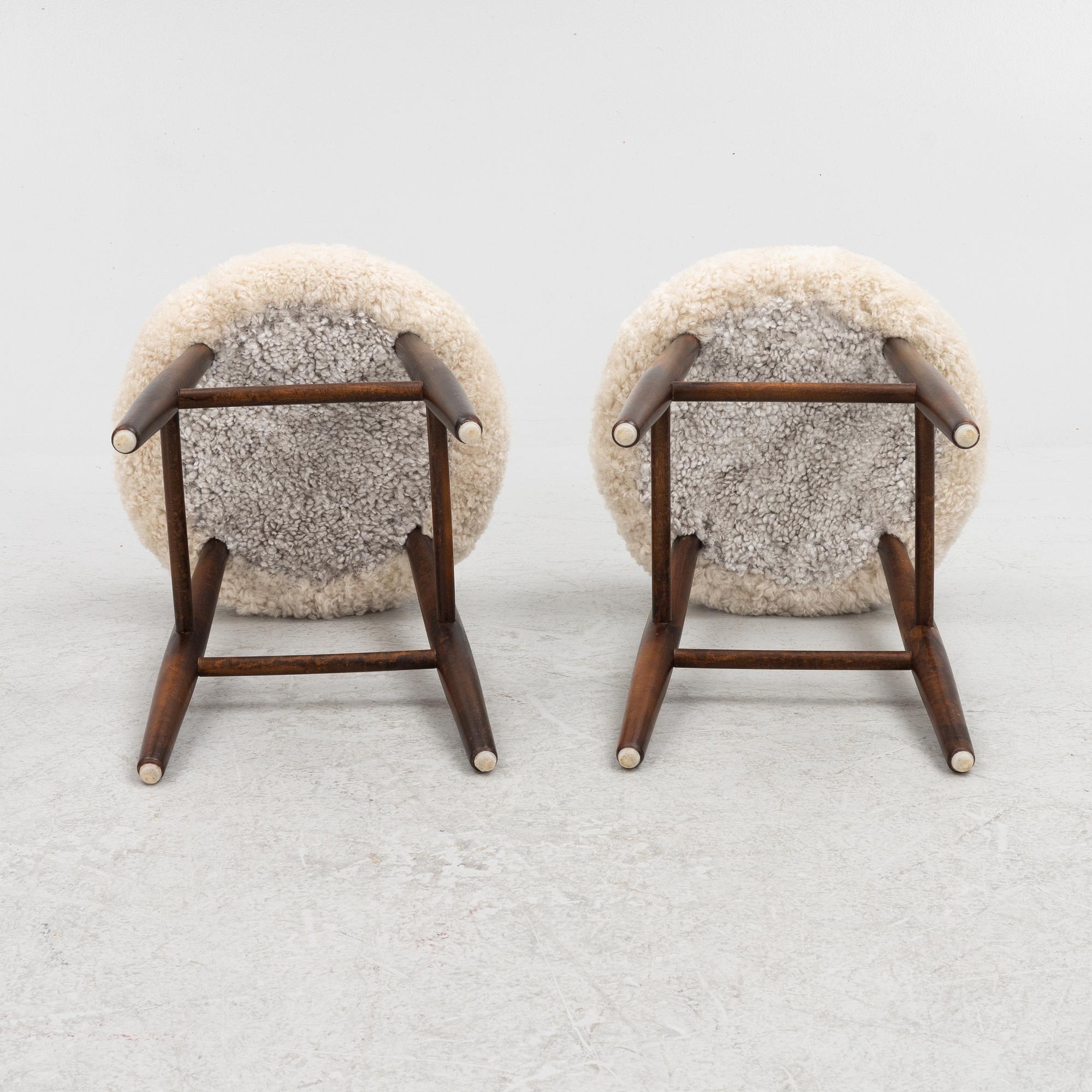Stools, a pair. 20th century.