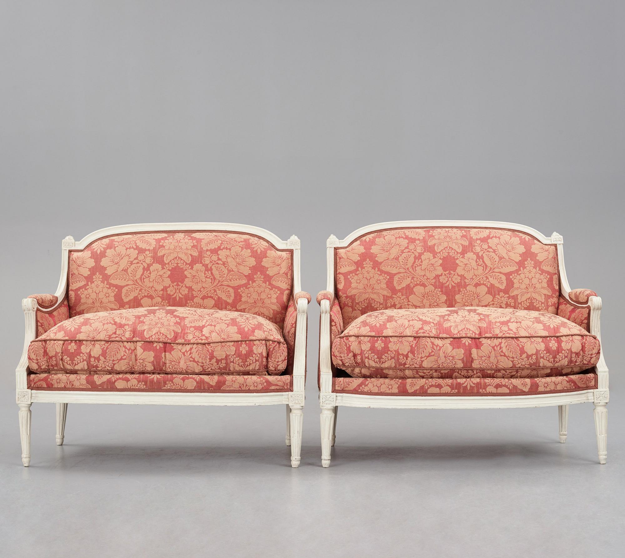 A pair of Louis XVI late 18th Century armchairs by M. dela Porte (Paris 1765-1784).