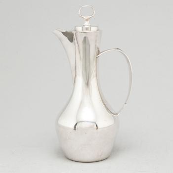 A silver claret jug from MGAB, Uppsala, 1967.