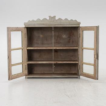 A wall cabinet, 19th Century.