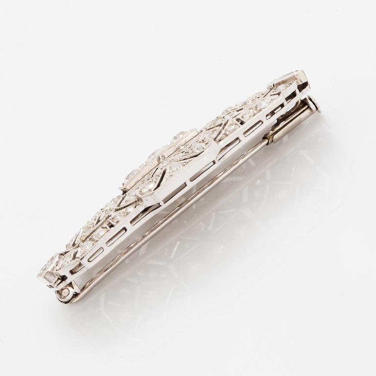 Rintaneula, 14 valkokultaa, vanhahiottuja ja ruusuhiottuja timantteja. n. 2.40 ct yht.
