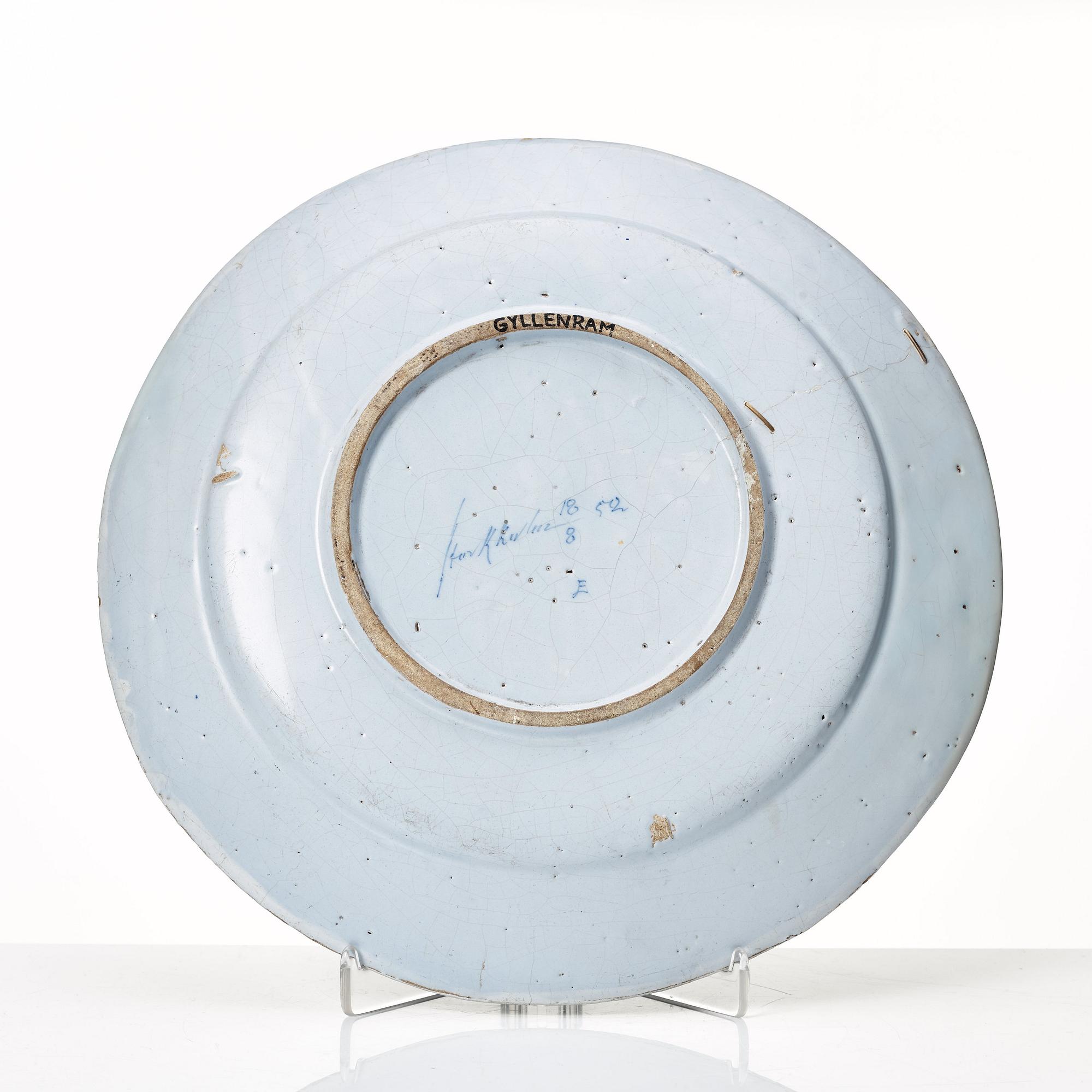 A large Swedish armorial serving dish with the arms of Gyllenram, dated Stockholm 18/8 1752.
