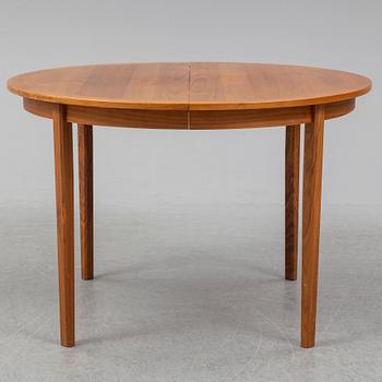 A 1950/60s teak and valnut table and four chairs.