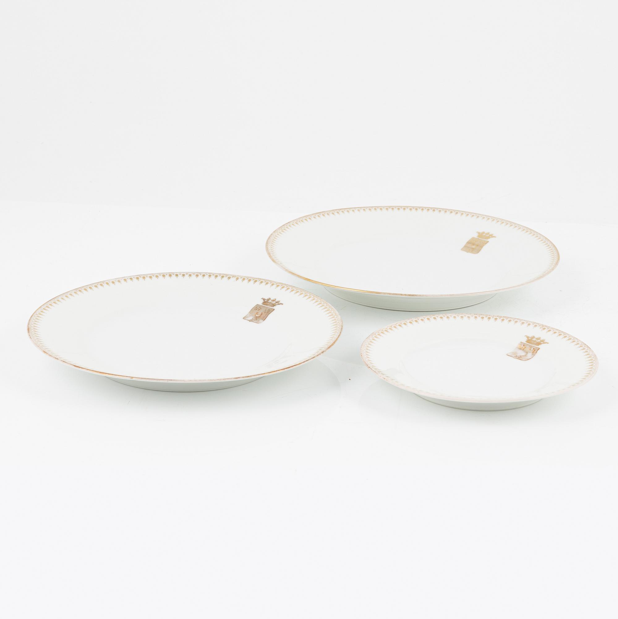 A 82 piece porcelin dinner service, France. With the Hamilton family coat of arms.