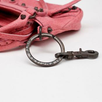 BALENCIAGA, a pink leather key chain.