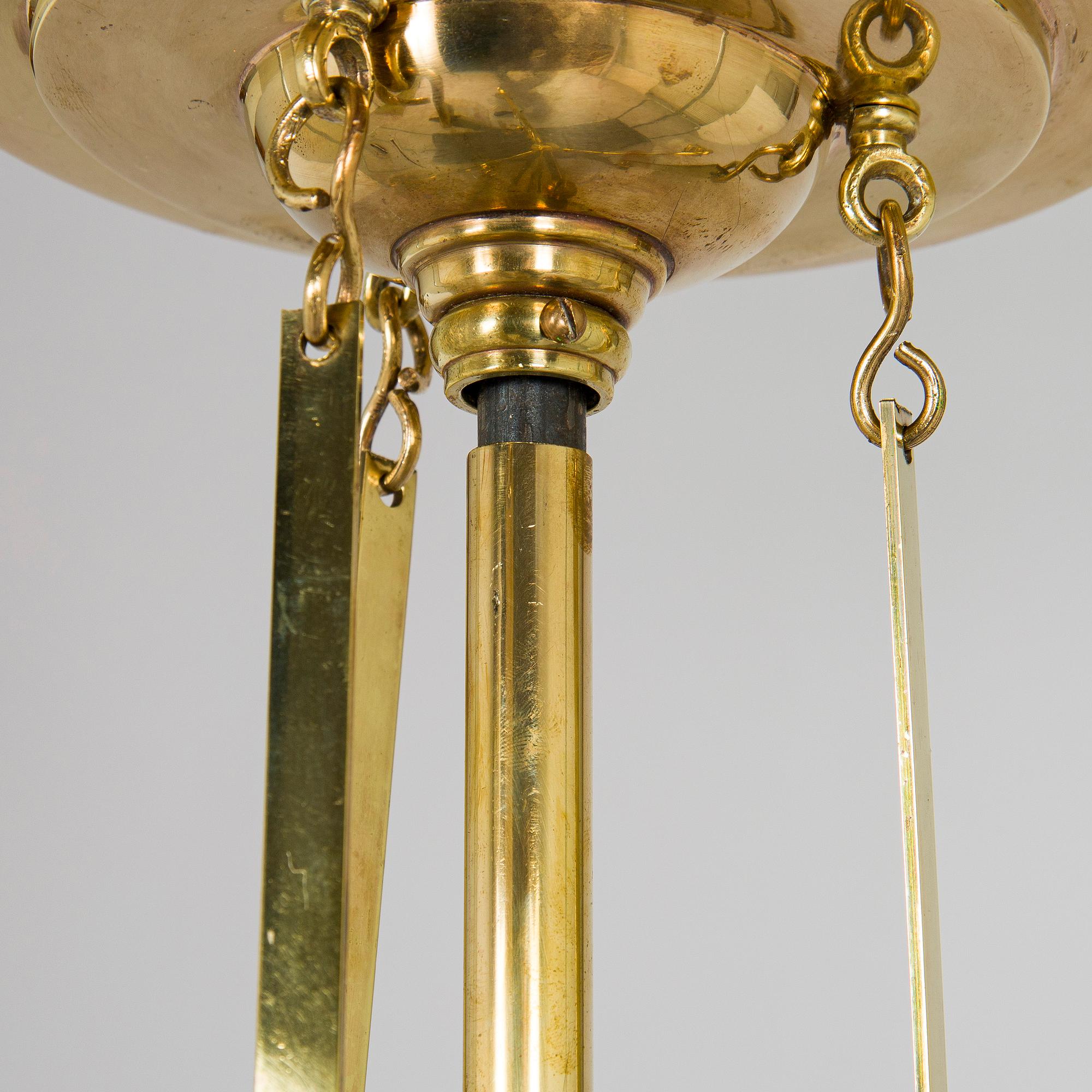 Kattovalaisin, 1900-luvun alku.