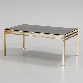 A 20th century brass and glass table.