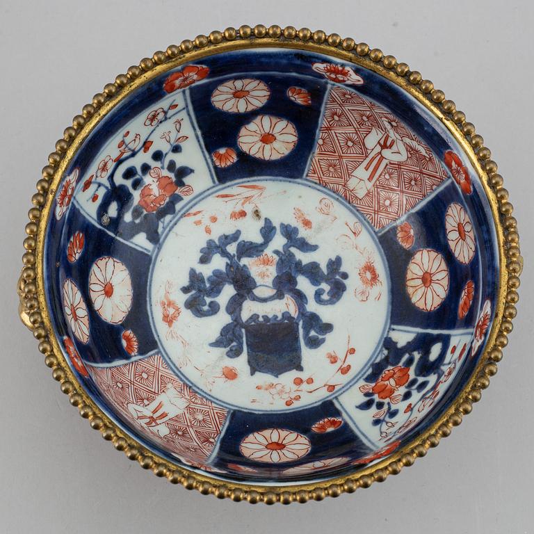 A Japanese imari bowl, with  European bronze mount, 19th century.
