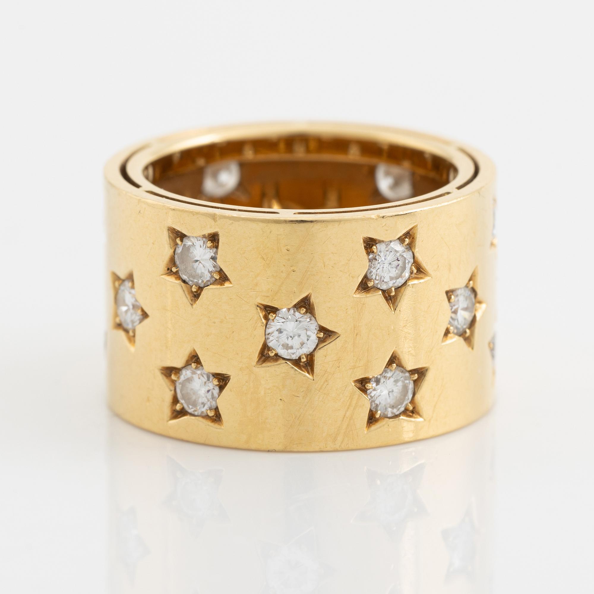 Brilliant cut diamond star shaped ring.