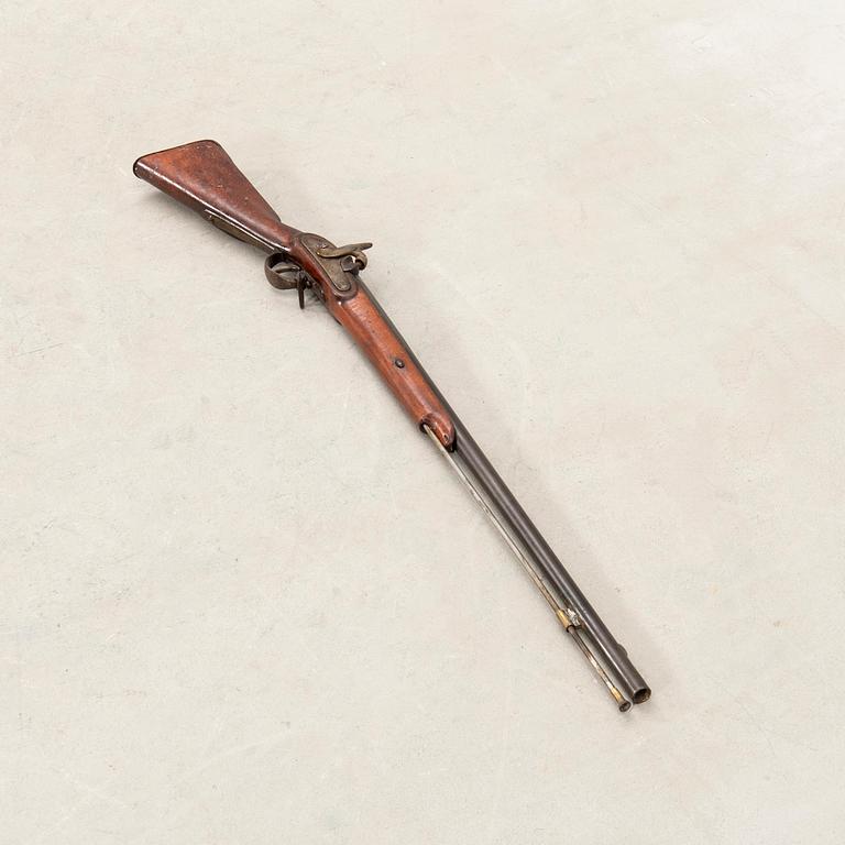 A percussion rifle, Swedish, m/1851 alteration model.