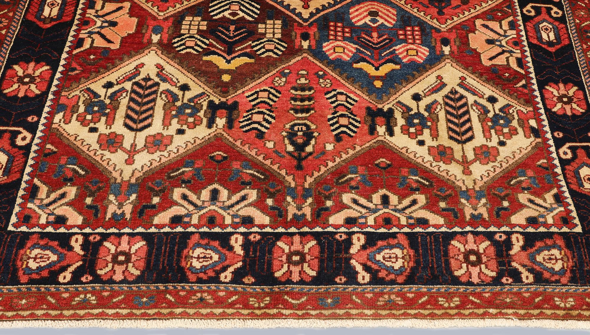 A rug, Bakhtiari, approx. 296 x 159 cm.