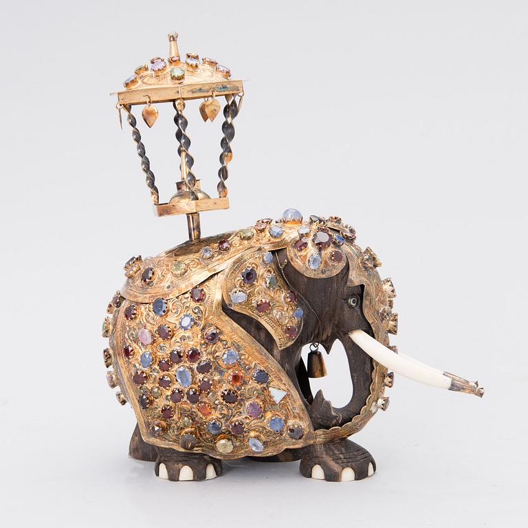 A SRI LANKAN ELEPHANT SCULPTURE, wood, silver and semi-precious stones, second half of the 20th century.